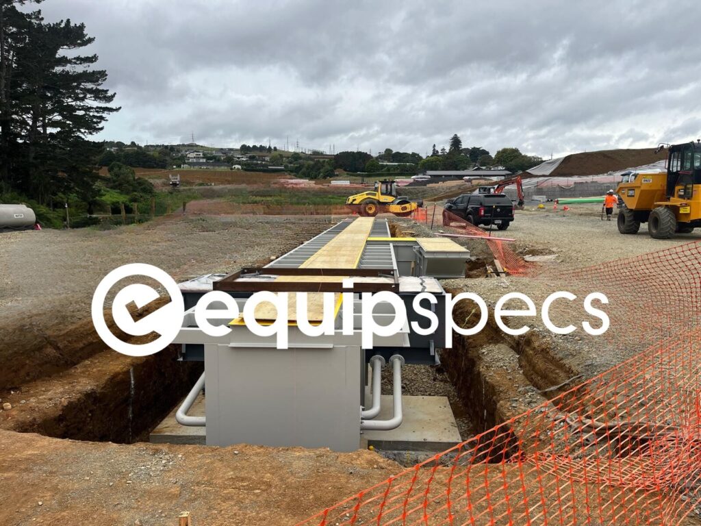 Prefabricated steel inspection pit being installed by EquipSpecs