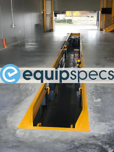 Completed prefabricated steel inspection pit with the EquipSpecs logo. 