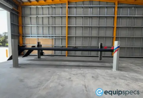 A wide angle shot of the Velyen Heavy Duty Four Post Lift installed by EquipSpecs. 