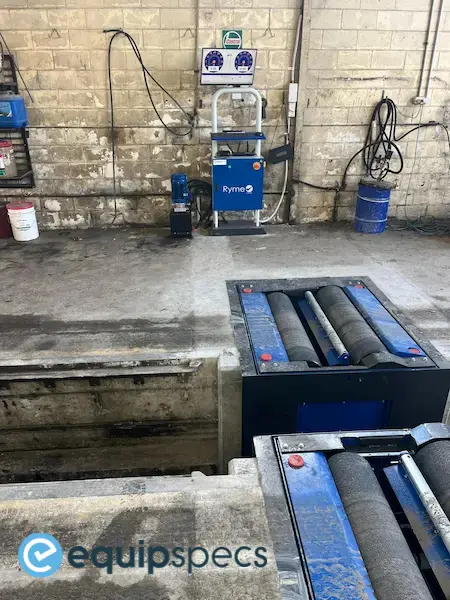 Image of a Ryme Worldwide FRU 4 brake machine with the Ryme Worldwide cabinet and screen showing the SMRW software package - installed by EquipSpecs.