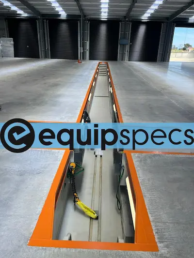 Prefabricated steel inspection pit installed by EquipSpecs. 