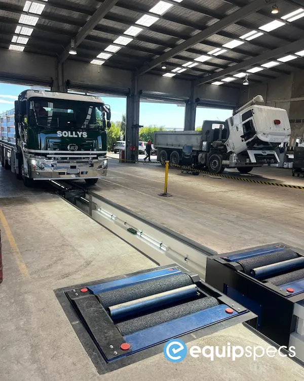 Low-voltage LED pit lighting installed inside the extended inspection pit.