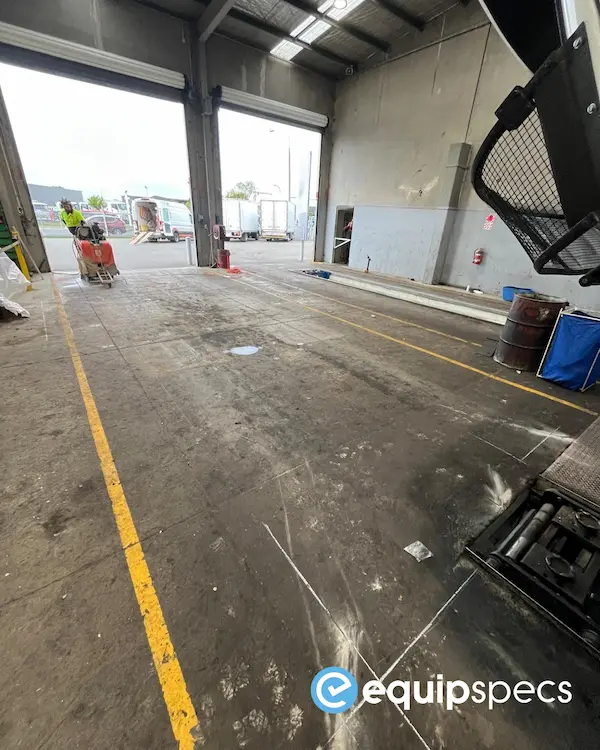 Existing heavy-vehicle workshop bay before pit extension and brake tester installation.