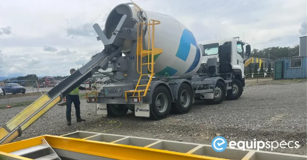 Concrete being poured around an EquipSpecs prefabricated steel inspection pit during final placement, showing efficient reinstatement and integration.