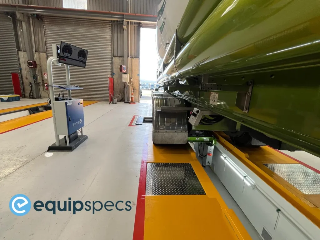 COF inspection lane integrating prefabricated steel pit and Ryme Worldwide FRU 4 brake tester within an existing workshop.