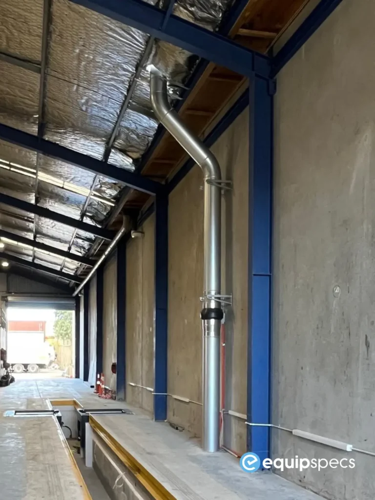 Heavy vehicle inspection pit ventilation system installed inside a workshop by EquipSpecs, featuring ducted airflow extraction designed to support safer pit-level ventilation and AS/NZ 60079-aligned compliance.