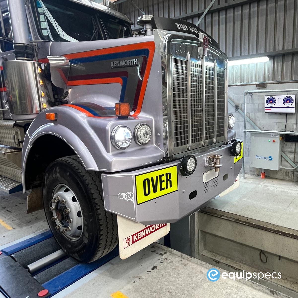 Heavy truck positioned on a Ryme Worldwide truck roller brake tester for in-house brake testing in a New Zealand workshop.